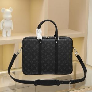 All-Steel Hardware The rugged Damier Graphite canvas lends this Porte-Documents Voyage Small Briefcase a distinctive character. Smooth leather trim and a spacious interior create the perfect blend of luxury and practicality. Dimensions: 35.0 x 27.0 x 6.0 cm